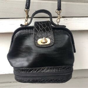 Vintage black leather pouch crossbody bag.